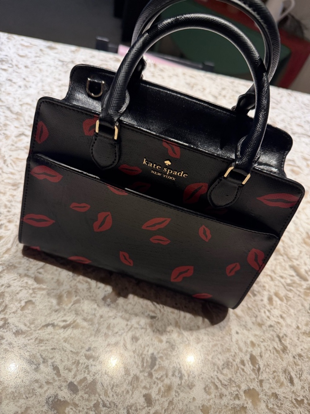 kate spade Black Satchel with Red Lip Print